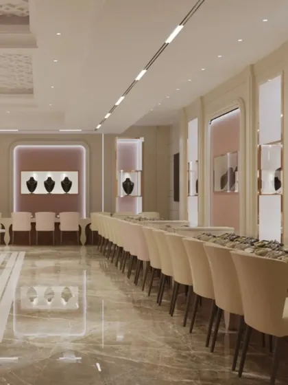 The main sales floor of Batukbhai Jewellers, designed for a seamless and elegant customer journey. We used long, clean counters and comfortable seating, with soft pink back-paneled displays to create a warm and inviting atmosphere for browsing.