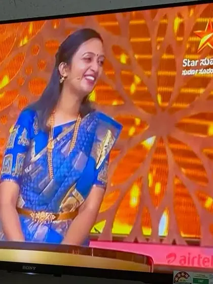 A candid moment on the stage of Suvarna Super Star.