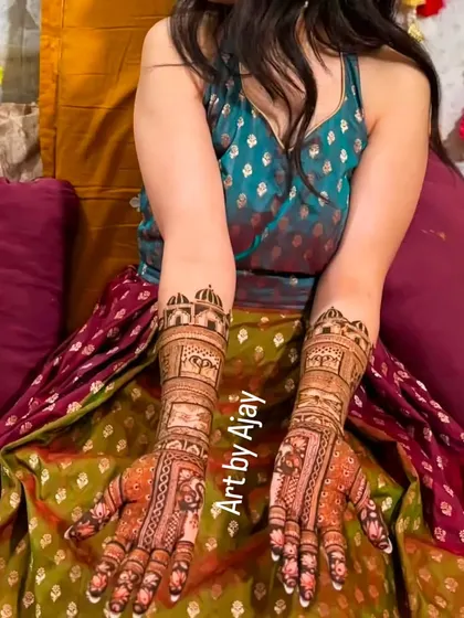 A close-up of the bride's hands, showing the intricate and symmetrical design I created for her.