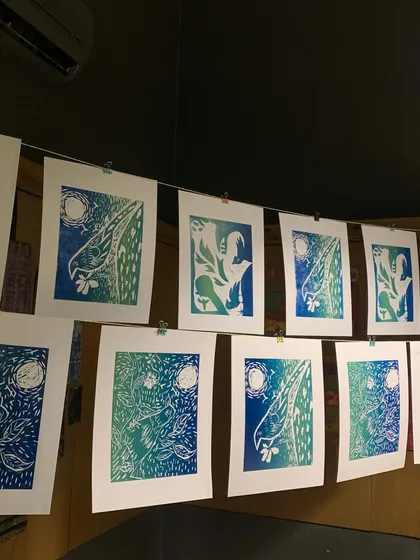 A fresh batch of two-color woodcut prints hanging to dry in the studio. Seeing the full edition of prints together is always a rewarding moment, showcasing the variations and consistency of the technique.