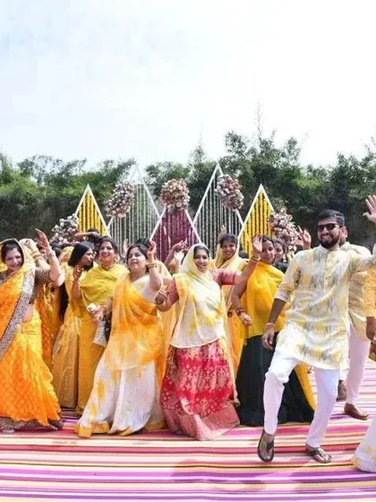 The joy of a coordinated family flash mob. Dressed in shades of yellow, the entire family came together to perform this routine we taught them for the Haldi function.