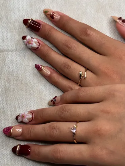 Another perspective on this stunning, multi-technique nail set, created by our talented students.