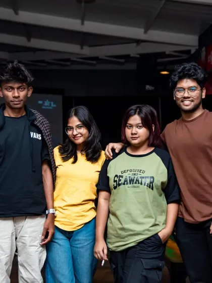 A group of friends hanging out, showcasing the casual and welcoming atmosphere of the pub.
