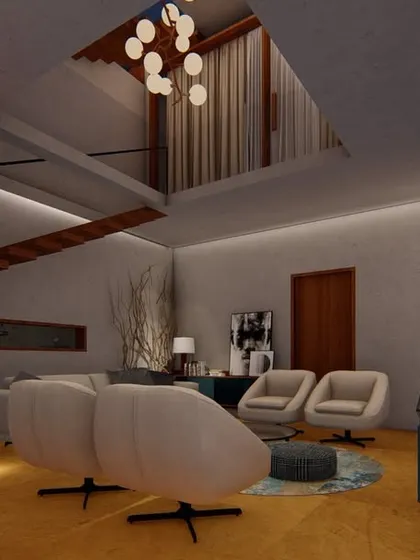 This living room combines rustic and industrial elements, with an exposed brick wall and a double-height space with a visible ceiling beam. The design creates a cozy, loft-like feel with a modern touch.