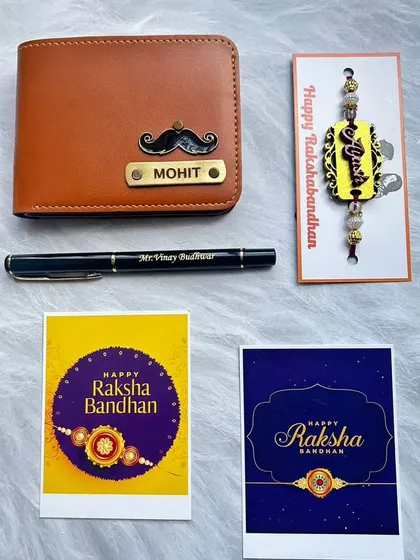 Another variation of my popular Rakhi combo, this one features a tan wallet with a mustache charm. You can customize the wallet, pen, and rakhi with your brother's name.
