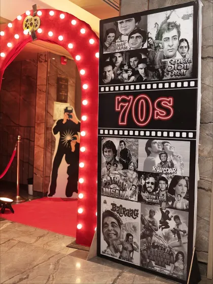 A 70s movie poster collage, part of the detailed decor that made the retro theme so authentic.