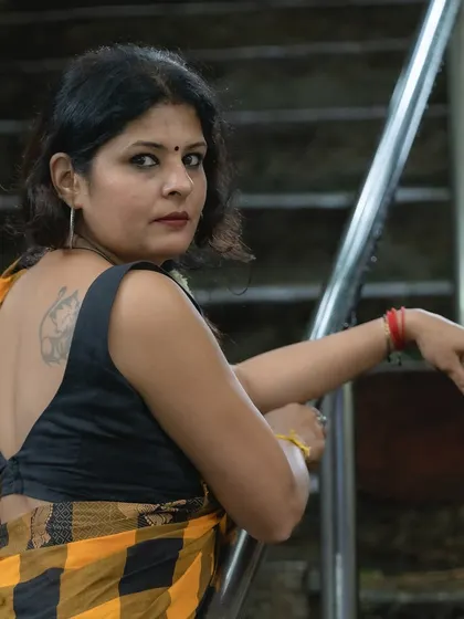The back view of the Kanchi cotton saree look, showing the deep-cut sleeveless blouse and my tattoo. Personal style is about showcasing all parts of who you are.
