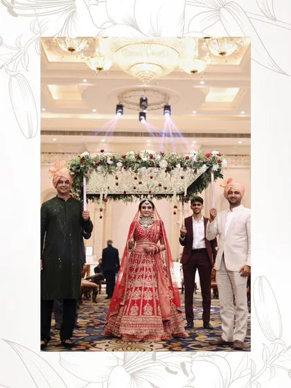 The bride's grand entry under a phoolon ki chadar. Her makeup is designed to make a statement from the moment she appears.