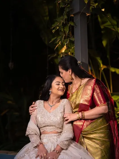 A heartwarming moment between the bride and her mother at the engagement party, a memory to be treasured forever.