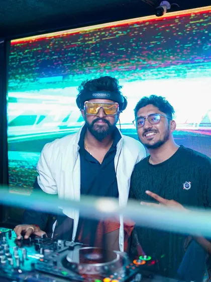 A great moment with a friend behind the decks at Drava Lounge. It's always good to share the vibe with fellow music lovers.