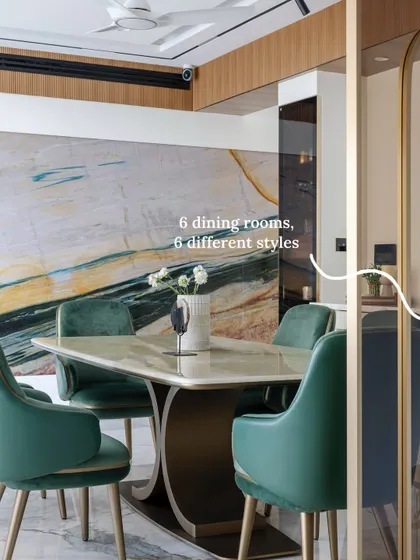 An example of a "Marble on Marble" dining room design. A bold, exotic marble wall serves as the focal point, with its pattern echoed in the marble-top dining table for a cohesive and luxurious statement.