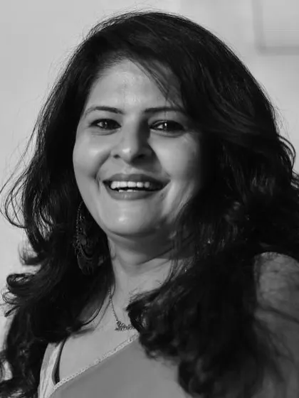 A joyful, laughing portrait in black and white. It proves that monochrome can be just as expressive and happy as color.