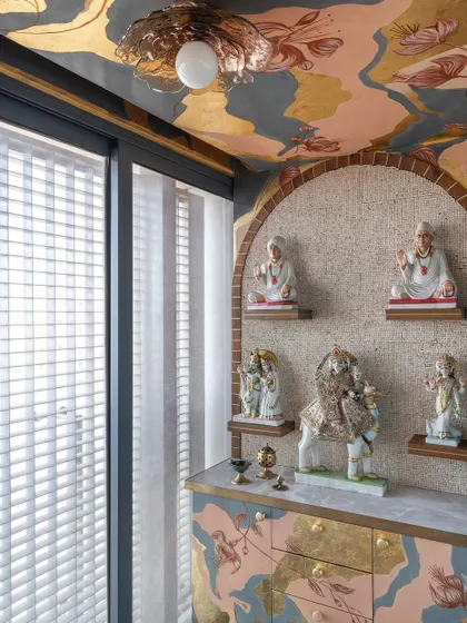 A mandir is more than a space; it's a sanctuary. For this home, I designed and painted a 'Fortune Shrine', creating a serene and sacred environment. The abstract patterns and hints of gold are meant to evoke a sense of peace and devotion, making the space truly divine.