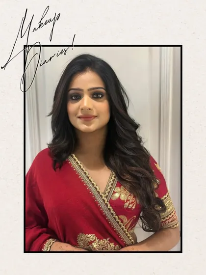 A beautiful, soft glam look for an evening party. The makeup features a neutral color palette with a focus on radiant skin and defined eyes, perfectly complementing her red and gold outfit.