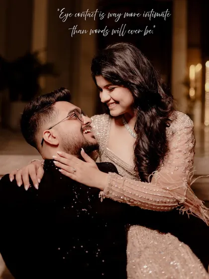 A candid and joyful moment captured during an indoor shoot. The genuine smiles and eye contact show the deep friendship and love the couple shares, making for a heartwarming portrait.