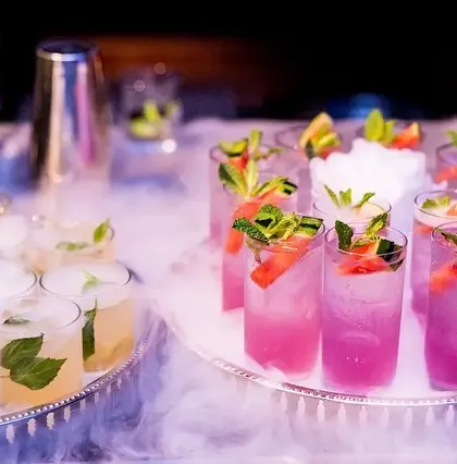 This was for a pink-themed destination wedding. I created a series of color-coordinated cocktails and used dry ice to create a magical, smoky effect across the bar, perfectly matching the event's aesthetic.