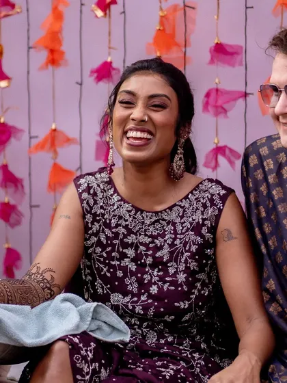 The bride's happy laugh during her Mehendi ceremony.