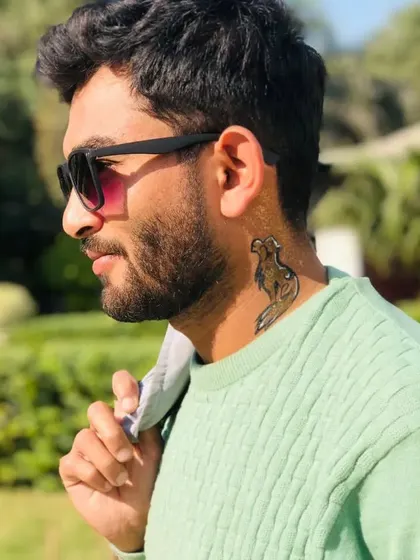 A stylized fox temporary tattoo on the neck. I can create all kinds of animal designs in this minimalist style.
