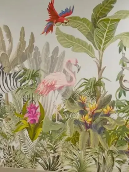 This vibrant jungle-themed wallpaper is filled with exotic animals like parrots, flamingos, and zebras. It’s a playful and lively design that can bring energy and a sense of adventure to any space.
