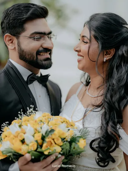 A close-up of the happy couple, their smiles telling the whole story.
