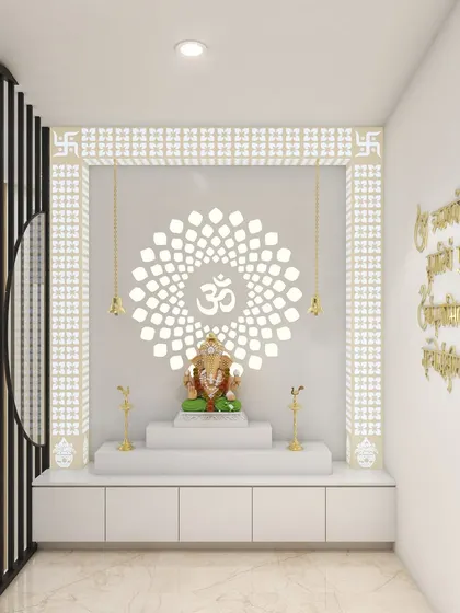 A stunning modern pooja room design. The backlit "Om" mandala is the centerpiece, framed by intricate jali work. The gold lettering on the wall adds a touch of opulence.