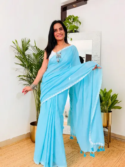 A simple and elegant sky blue khadi cotton saree. This is a perfect summer saree that is breathable, comfortable, and looks very graceful.