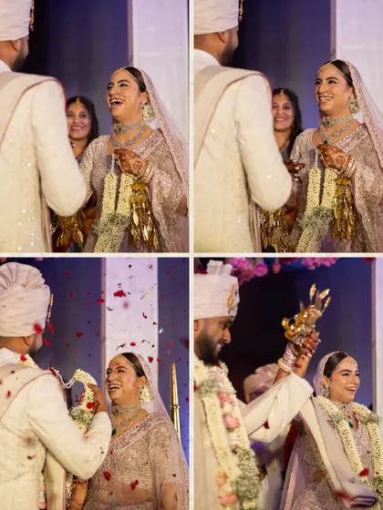 The pure, unscripted laughter during the varmala ceremony. These are the candid moments that truly define the wedding day.