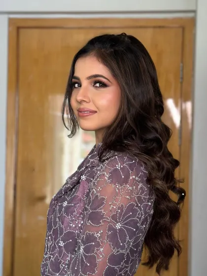 This angle shows the beautiful flow of the hair. It's a style that looks great in photos and in person.