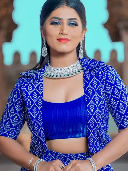 A confident pose showing the full outfit, perfect for a fashion-forward bride.