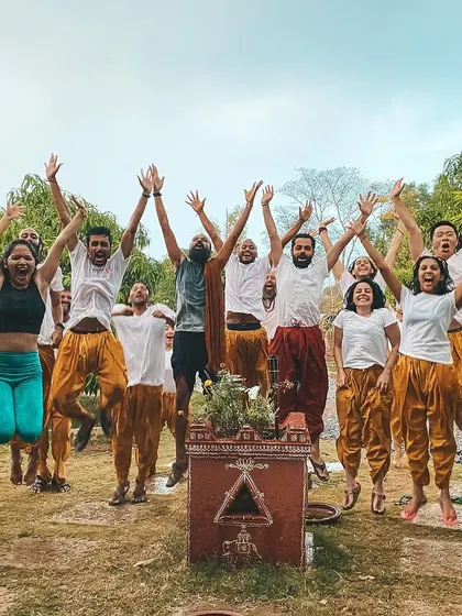 The exhilarating feeling of community and success. A group jump captures the high energy and shared joy of completing a challenging and rewarding journey together.