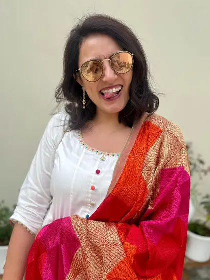 A fun and silly pose with my sunglasses on. Don't forget to have fun with your style.