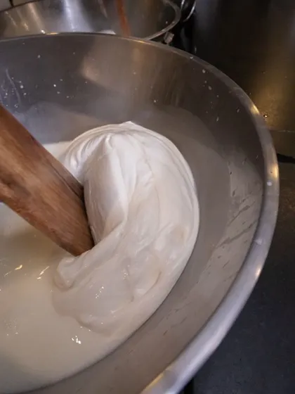 The final stages of stretching before the mozzarella is shaped. You can see the smooth, pliable texture we work so hard to achieve.