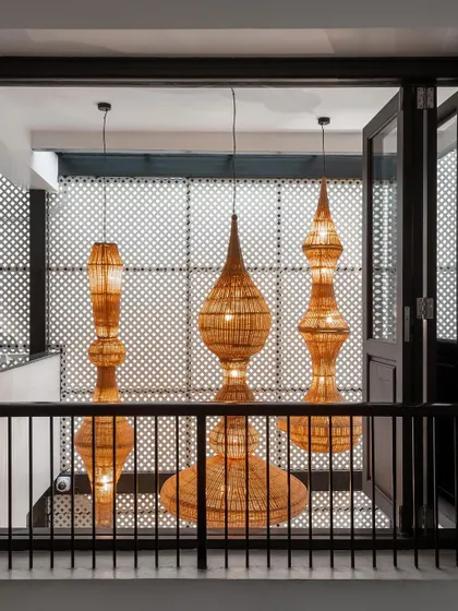 These large, sculptural pendant lights are made from cane by our collaborators at Bamboopecker. They serve as a stunning focal point in a double-height space, showcasing the beauty of natural, sustainable materials.
