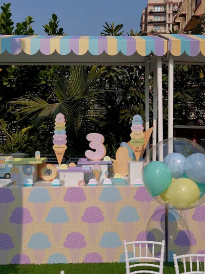 The main dessert and ice cream station, featuring a giant number "3" for the birthday girl.