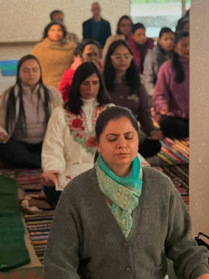 Participants with eyes closed in deep meditation during our New Year's gathering. This practice helps to center the mind and cultivate a sense of peace as we move into a new cycle.