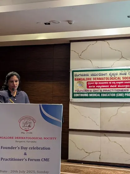 Speaking from the podium at the Practitioner's Forum CME. My goal is to bridge the gap between complex medical research and practical, effective treatments for my patients.