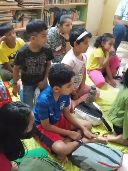 A classroom full of engaged students during a science session.