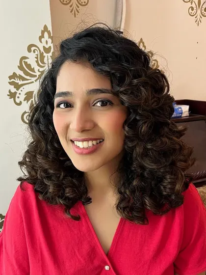 Hinshara, co-founder of Manetain, with her freshly shaped curls.