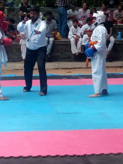Action from a local Kyokushin tournament. I often serve as a referee, ensuring fights are conducted with respect and adherence to the rules of full-contact karate.