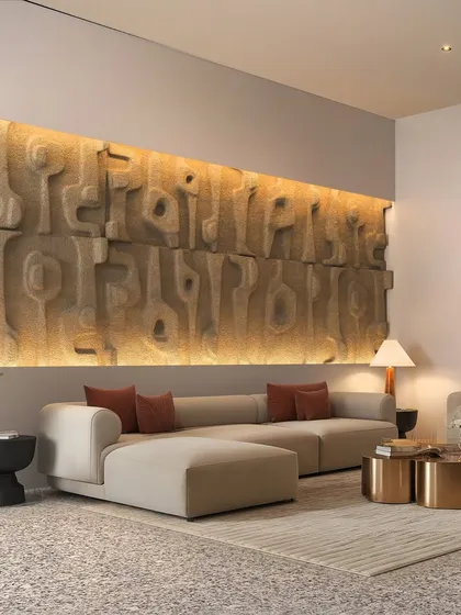 A custom-designed, backlit art wall serves as the focal point in this living space, adding texture and warmth to the minimalist design.