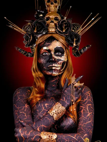 We witch you a Happy Halloween. This look is a deep dive into creative and SFX makeup, featuring body paint, gold leaf, and a custom-made skull headpiece.
