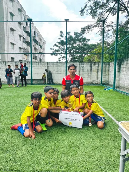The U08 team and their coach with their trophy and certificate after the Samurai Cup.