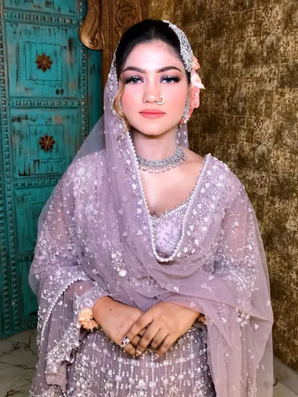 A frontal view showing the complete ensemble, from the hair accessory to the floral bracelets.