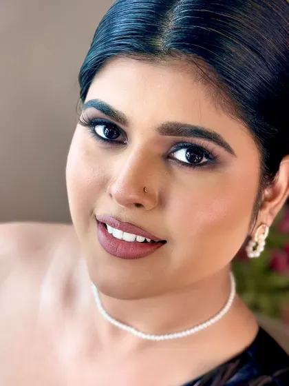 A happy, smiling close-up. This shows that a smokey eye can be glamorous and approachable at the same time.