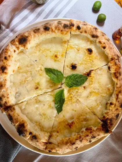 Introducing the Bianca Truffle! A rich, cheesy masterpiece for when you feel like dressing up your pizza night.