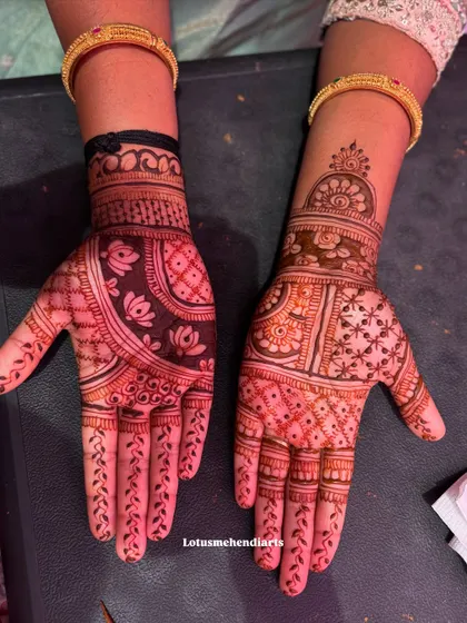 A pair of guest mehendi designs with contrasting styles. One hand has a dark, filled-in floral pattern, while the other features more delicate line work.