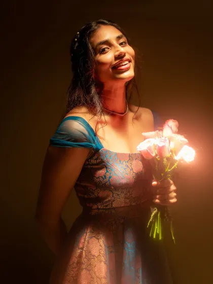 The unique fabric of this gown catches the light beautifully, shifting between shades of blue and pink.