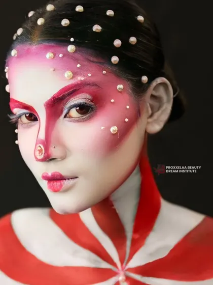 Embracing the winter season with a touch of frosty shimmer and bold graphic lines. This look is both festive and high-fashion.