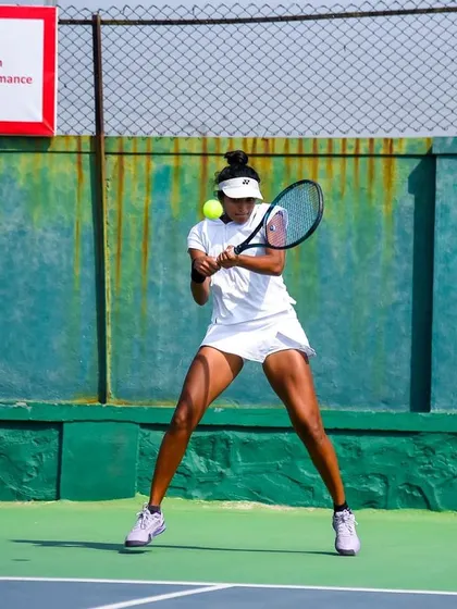 In action during the final of the ITF W25 Solapur. These photos show different aspects of my game under pressure, from hitting a running forehand to maintaining balance on a two-handed backhand.