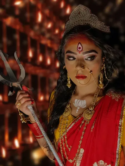 Another fierce portrayal of a goddess, showcasing the student's skill in creating strong, expressive looks.